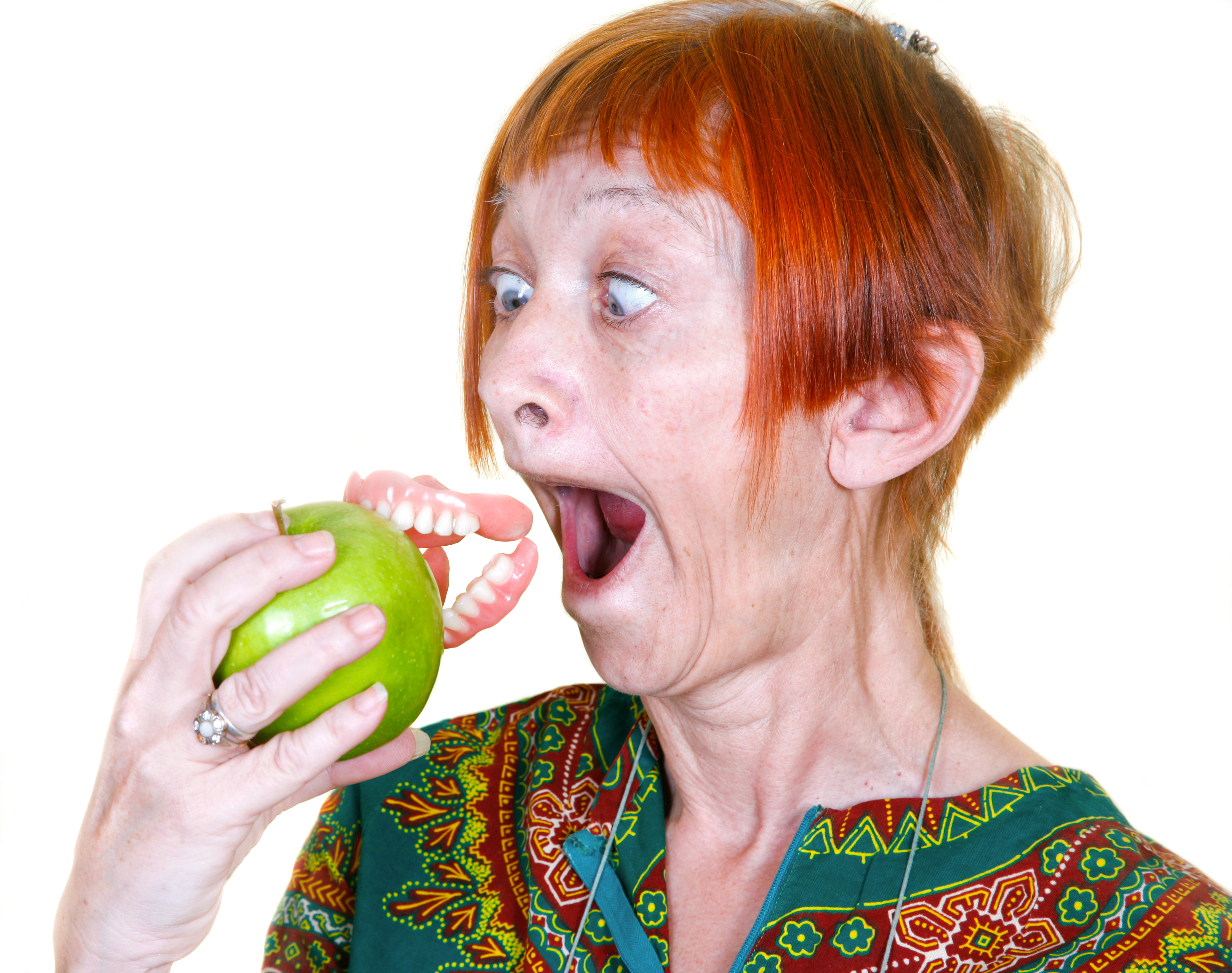Woman_losing_denture_by_biting_an_apple.jpg